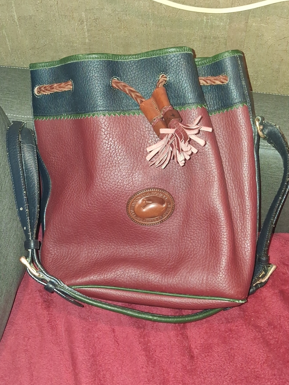 Dooney & Bourke Burgundy Leather Bucket Bag with Navy and Green Trim